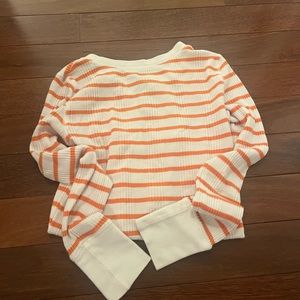 Long sleeve aire top with orange and white strips